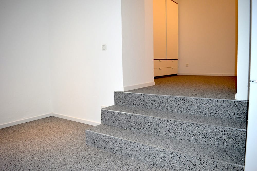 Steinteppich für Eingangsbereich und Treppen
